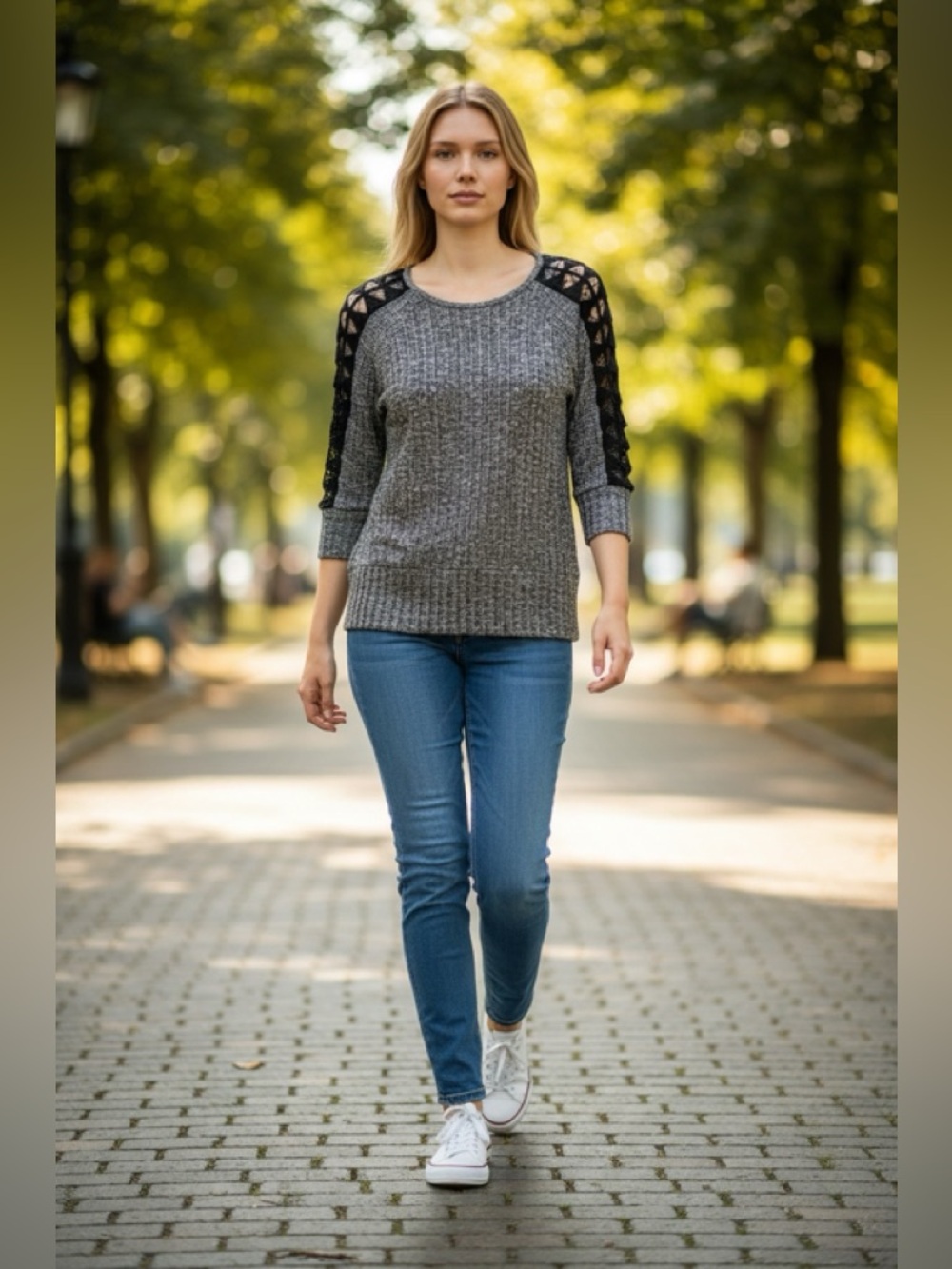 By & By gray and black ladies sweater size Xl runs. More toward large. Round col